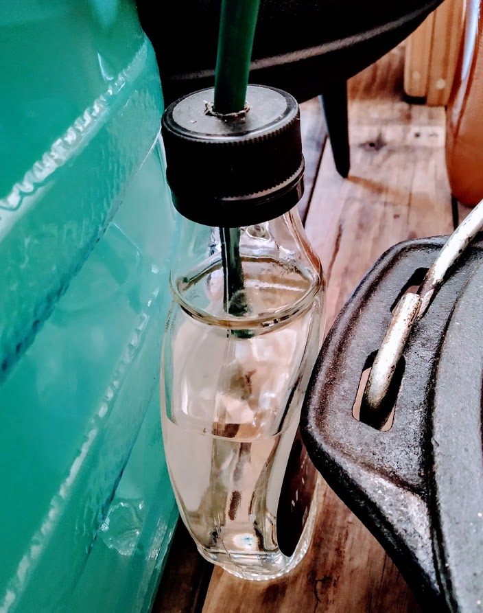 Hard times call for hard measure, and a homemade airlock device saves the day